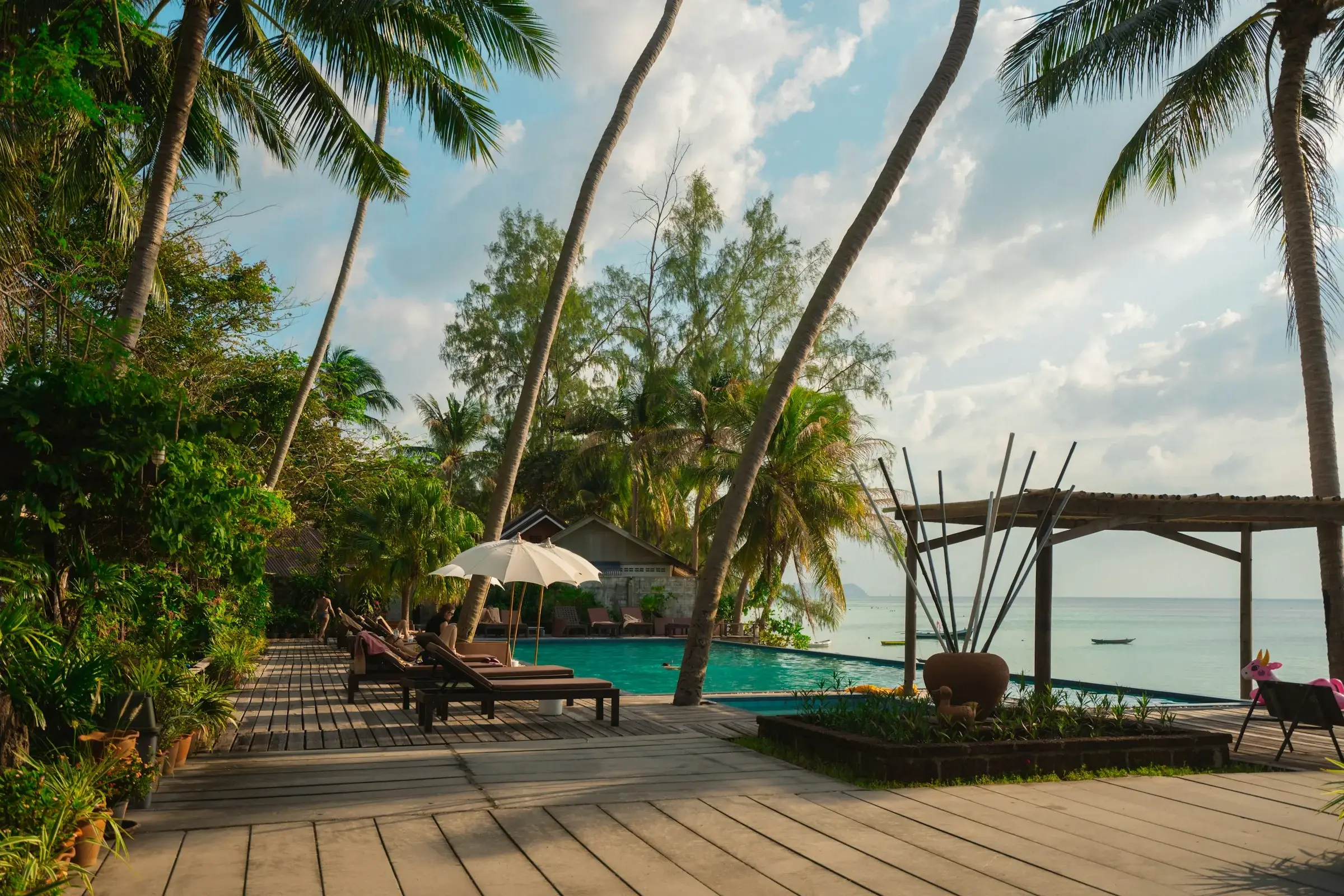 Couple relaxing in luxury resort pool